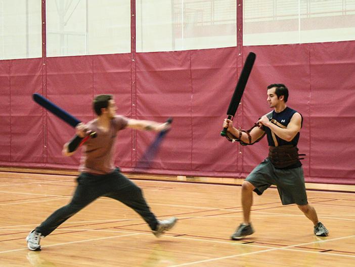 Zach Ziessler and Zach Moehn spar with /dagorhir swords, typically made with PVC or fiberglass pipes and hard foam Preface photo/MANDI STEFFEY