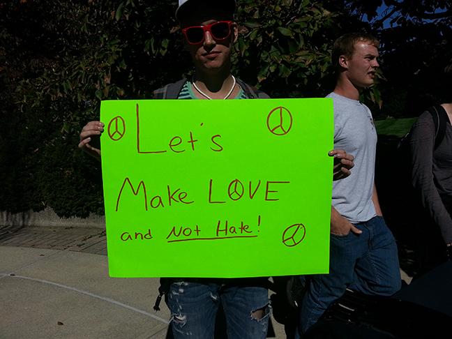 One of many signs students made to hold up during the impromptu counter-protest.