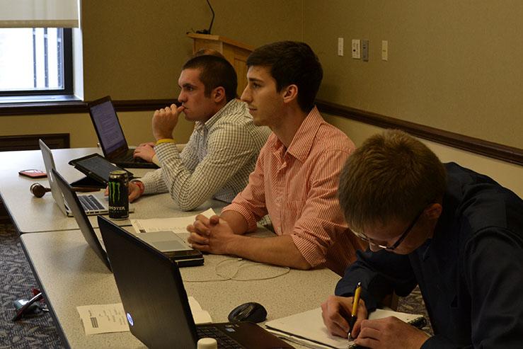 SGA President Lee Cohen (center) listens to the club’s reasoning for the protest.