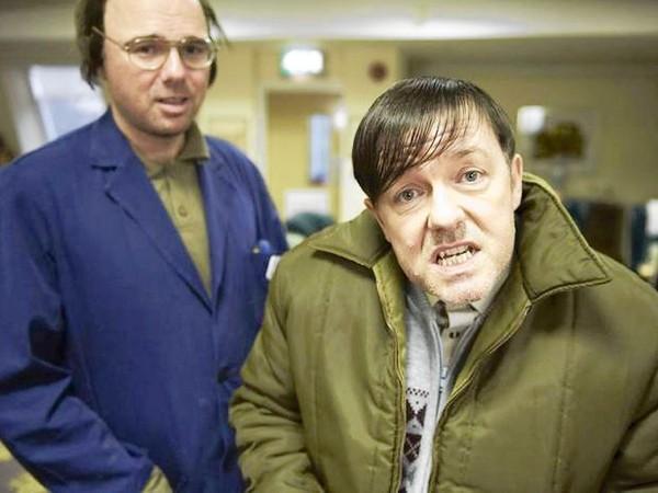 Karl Pilkington (left) stars alongside Ricky Gervais (right) who portrays Derek, a quirky and lovable caretaker at an English nursing home. Photo via/Netflix