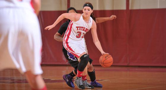 Maegan Callaway recorded her seventh double-double of the year as the Titans fell to the eighth-ranked Cougars of Saint Xavier University on Saturday, Jan. 11, by a score of 82-67. (Photo and caption courtesy of www.iusbtitans.com)
