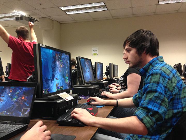 Nick Worsham (right) and Mike Moran (left) partake in a League of Legends gaming session in Northside. (Preface photo/GEOFF LESAR)