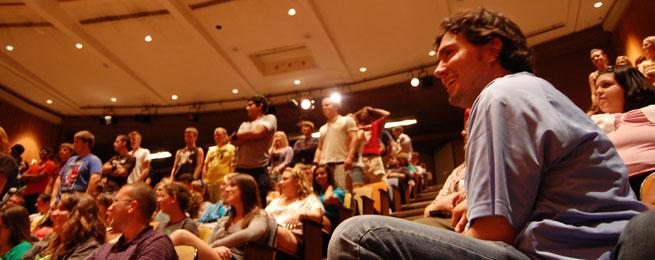 A full crowd looks on as hypnotist Chris Jones performs on campus, a previous event made possible by Titan Productions (Photo credit: www.iusb.edu)