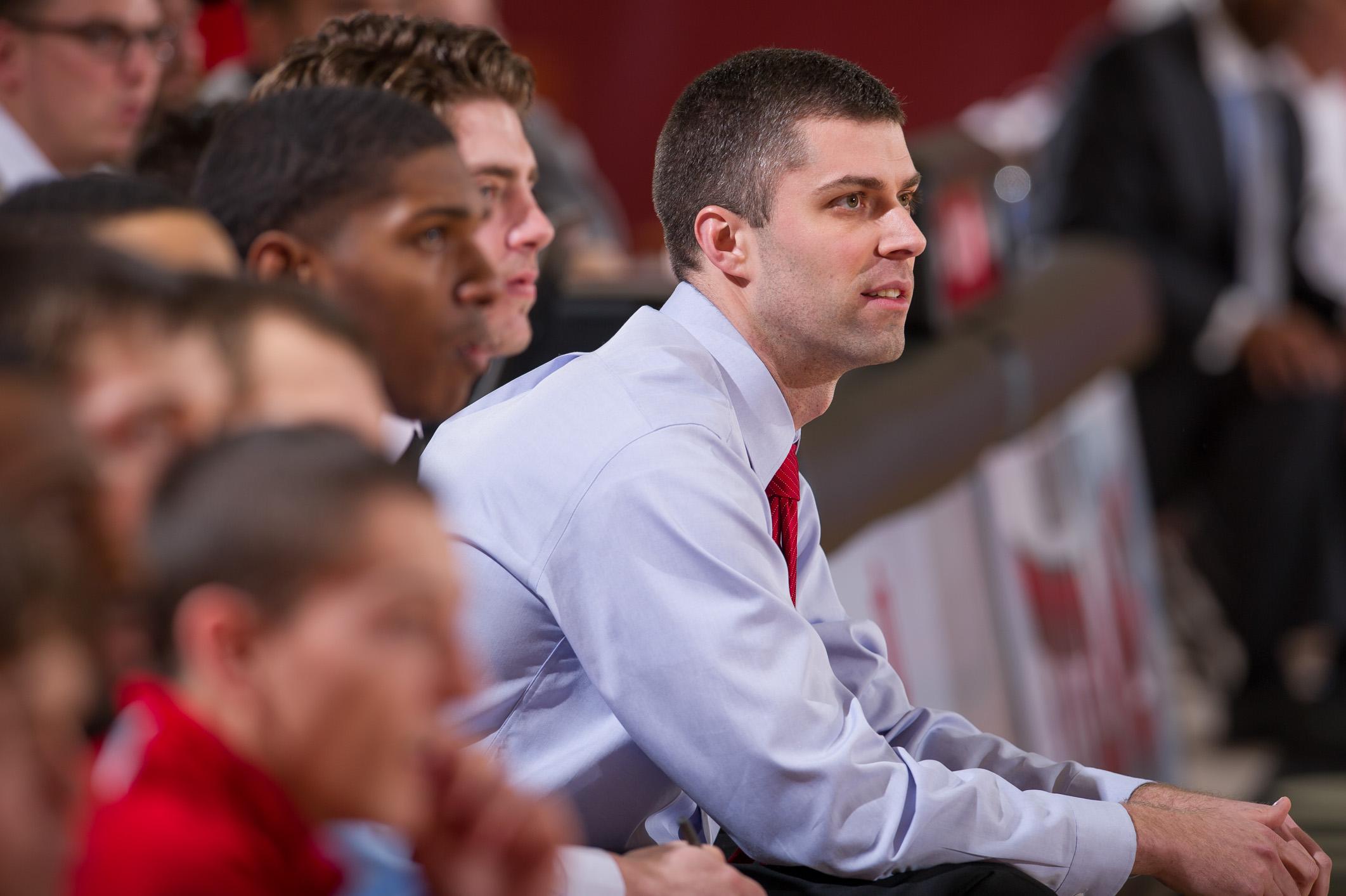 Scott Cooper watches from the sideline during his inaugural season with the men’s basketball team. (Photo Provided by Scott Cooper)