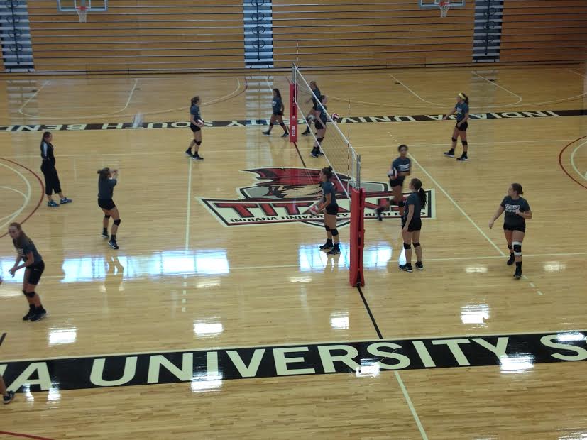 The lady Titans practice in the Student Activities Center as they gear up for their next game.