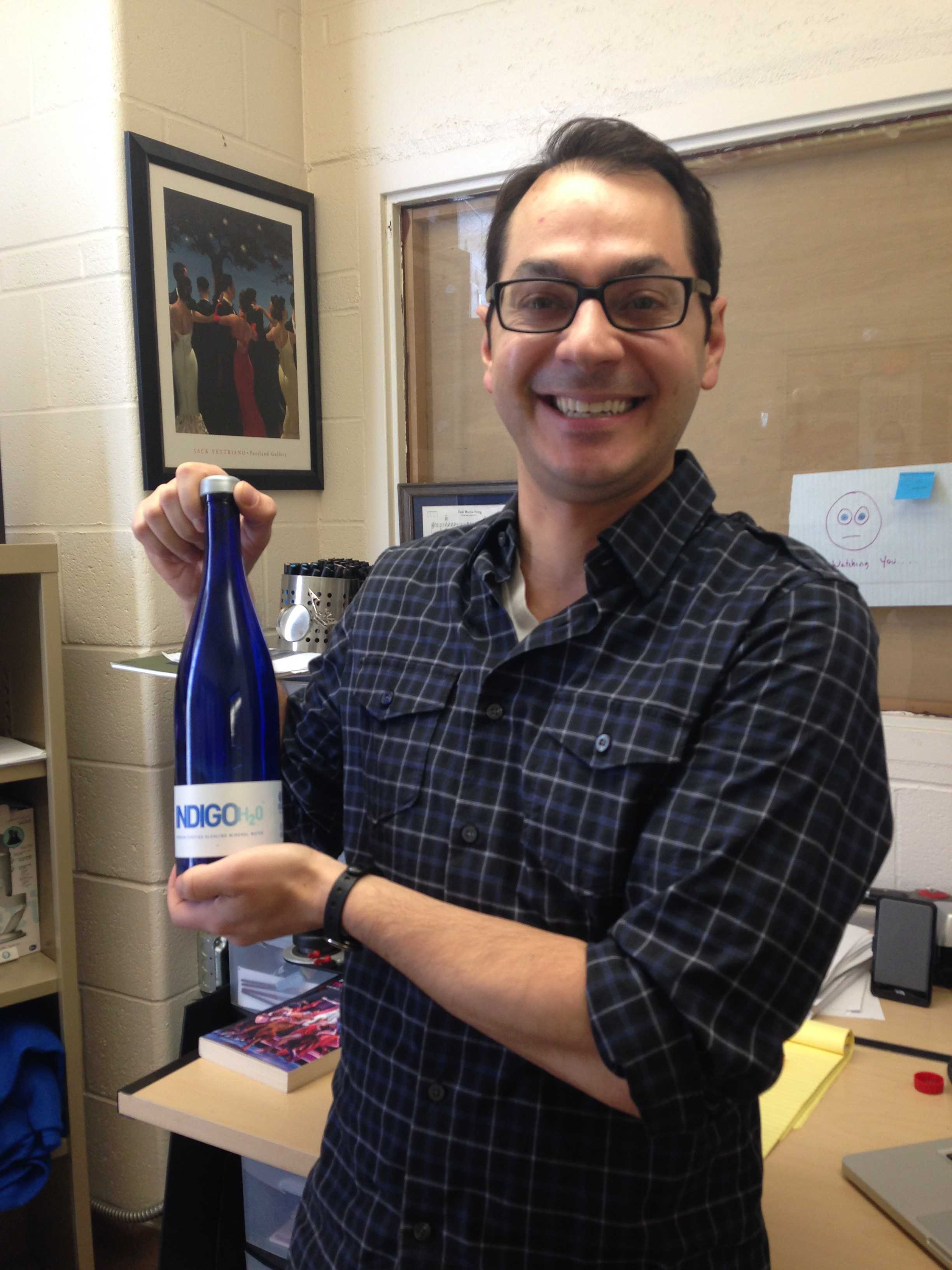 Photo Caption: Cataldo with a bottle of IndigoH2O. Photo credit/Amanda Barnett