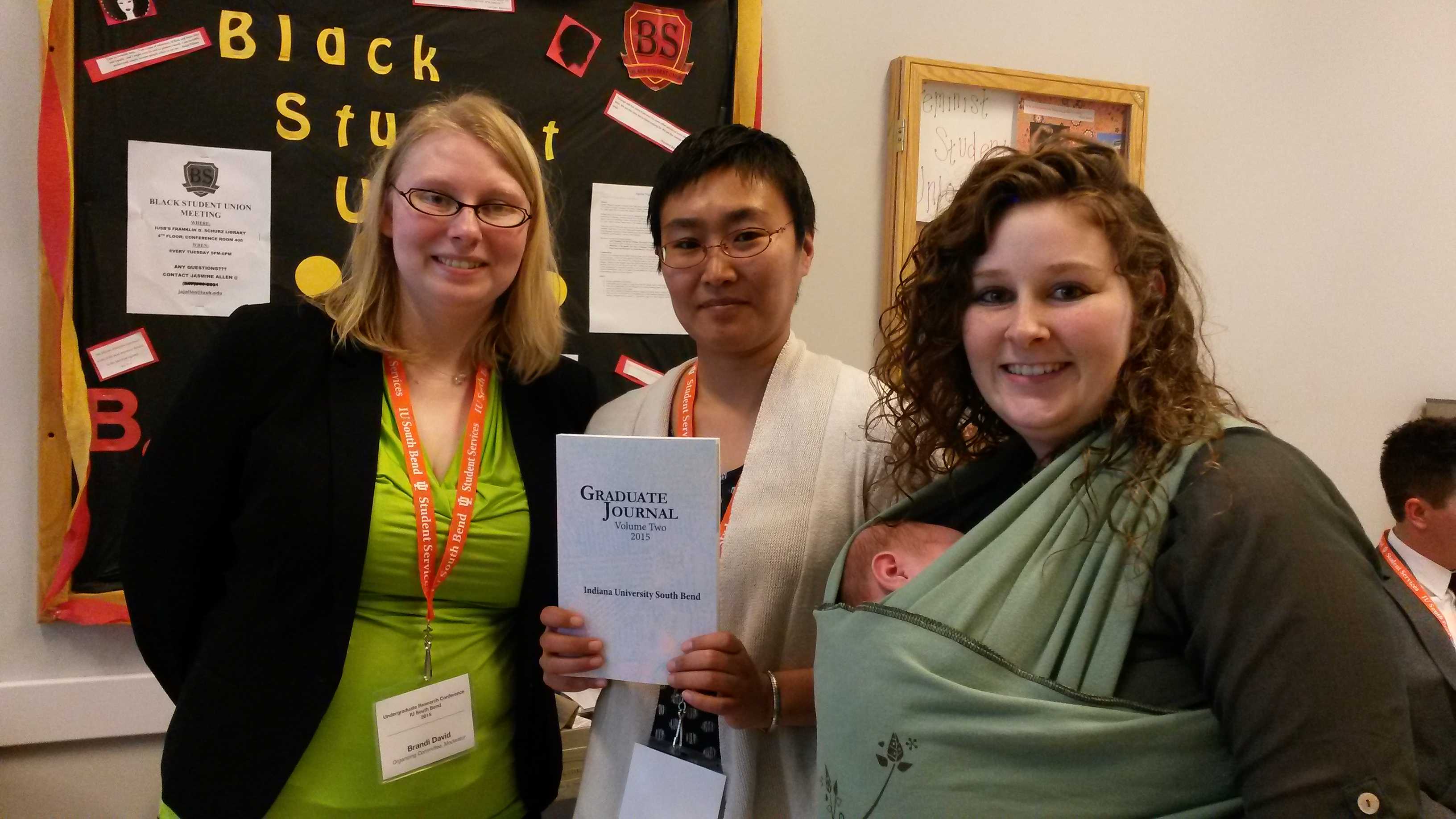 All the editors together Brandi David, Dr. Kyoko Takanashi, and Stephanie Foreman with her new baby boy.