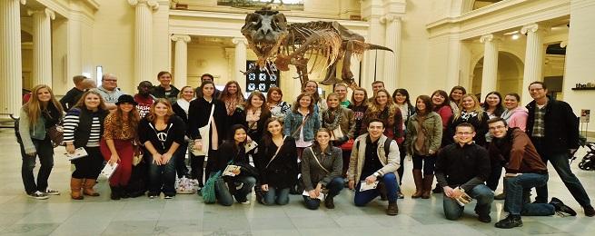 Honor students stopped to take a picture in front of Sue, the T-Rex at the Field Museum in Chicago.  Photo credit/Renae Michalski 
