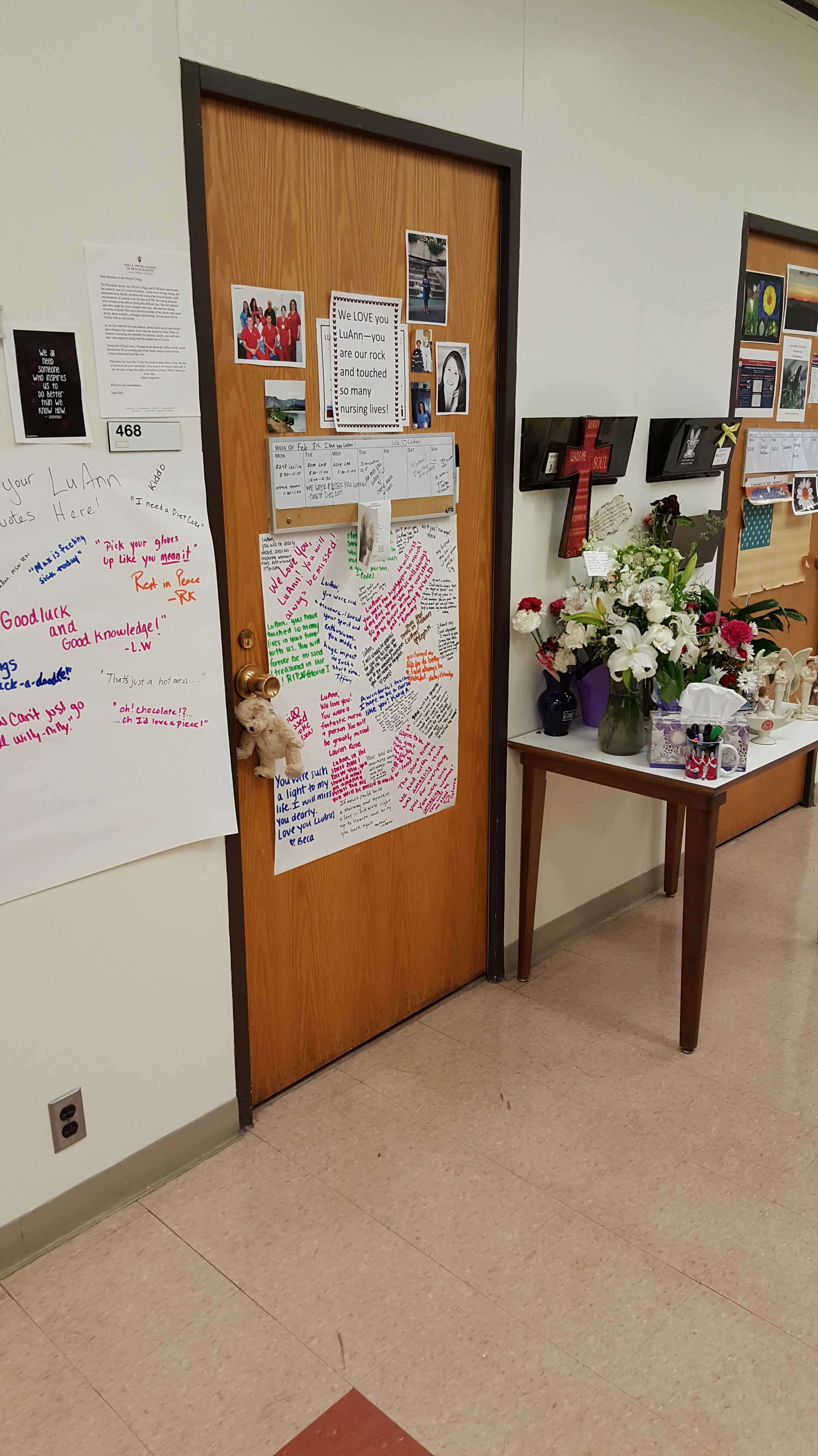 Faculty and students have turned the door to the late LuAnn Woodrick’s office in Northside Hall into a makeshift memorial. Photo Credit/Jim Irizarry