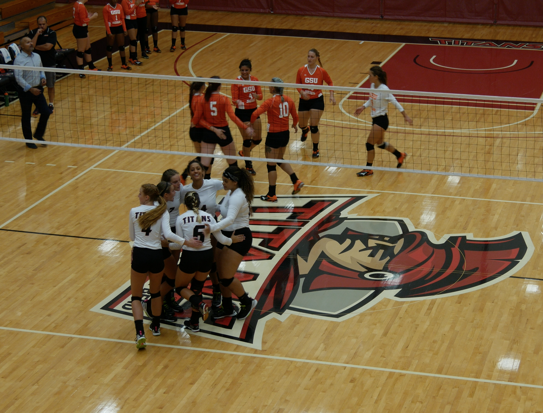 Titans celebrate after a play. PHOTO/Sarah Whitehead