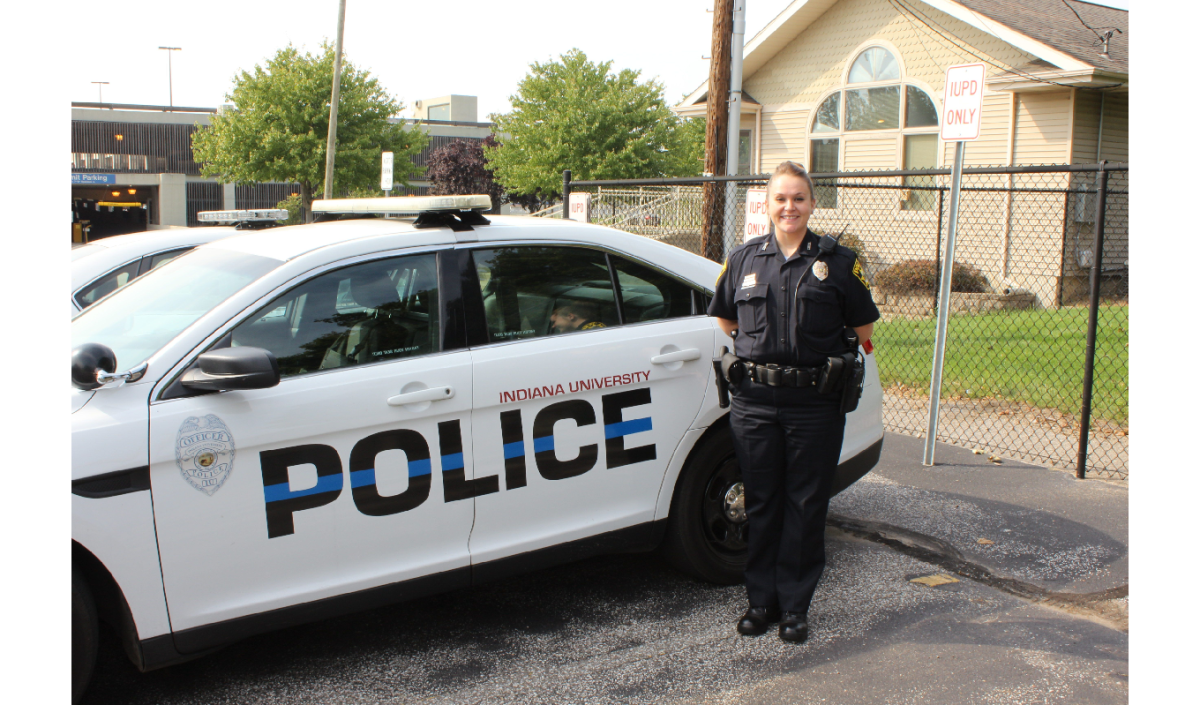 Melissa Hall stands beside an IUSBPD squad car. PHOTO/IAN BROWN