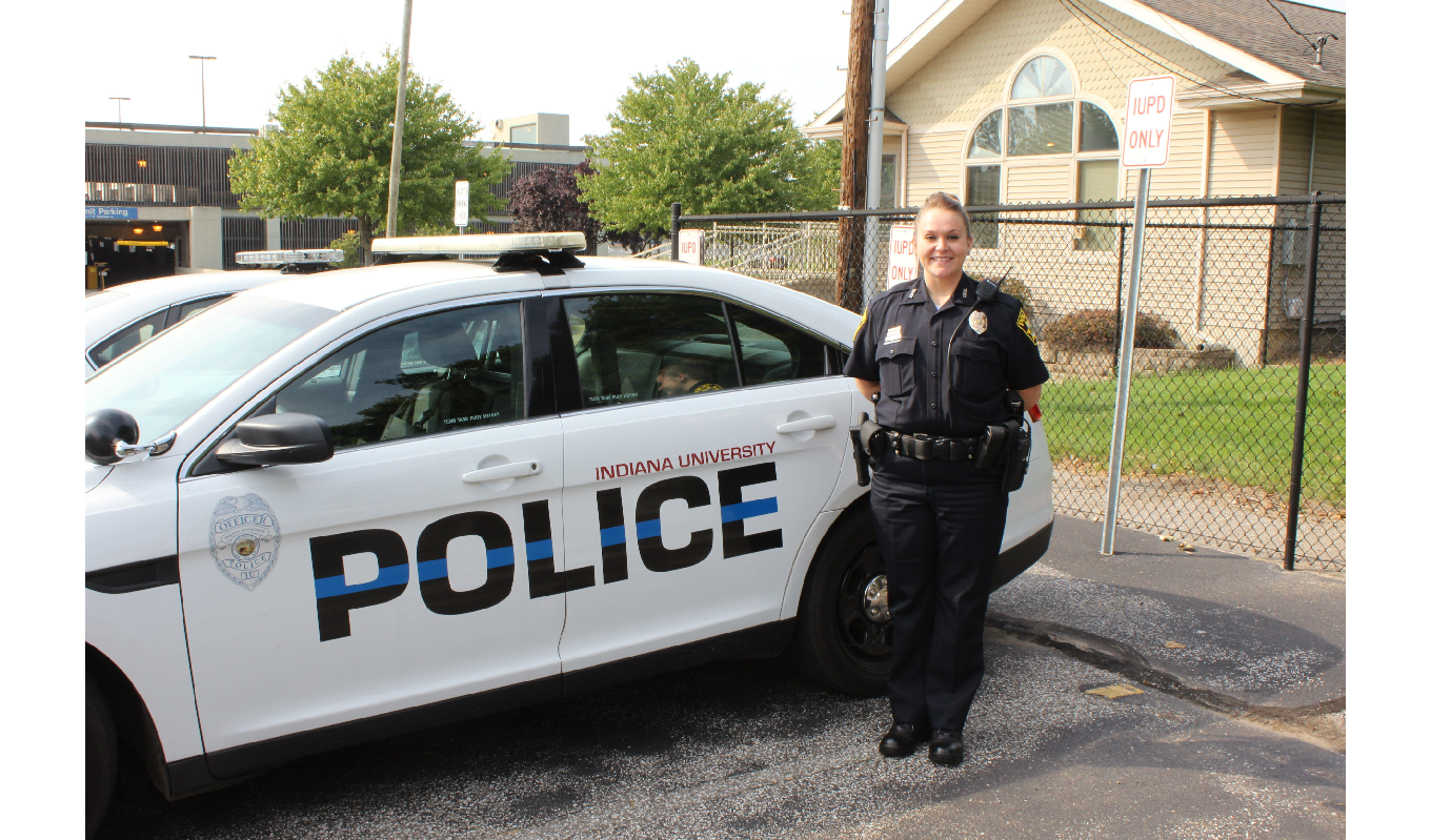 Melissa Hall stands beside an IUSBPD squad car. PHOTO/IAN BROWN