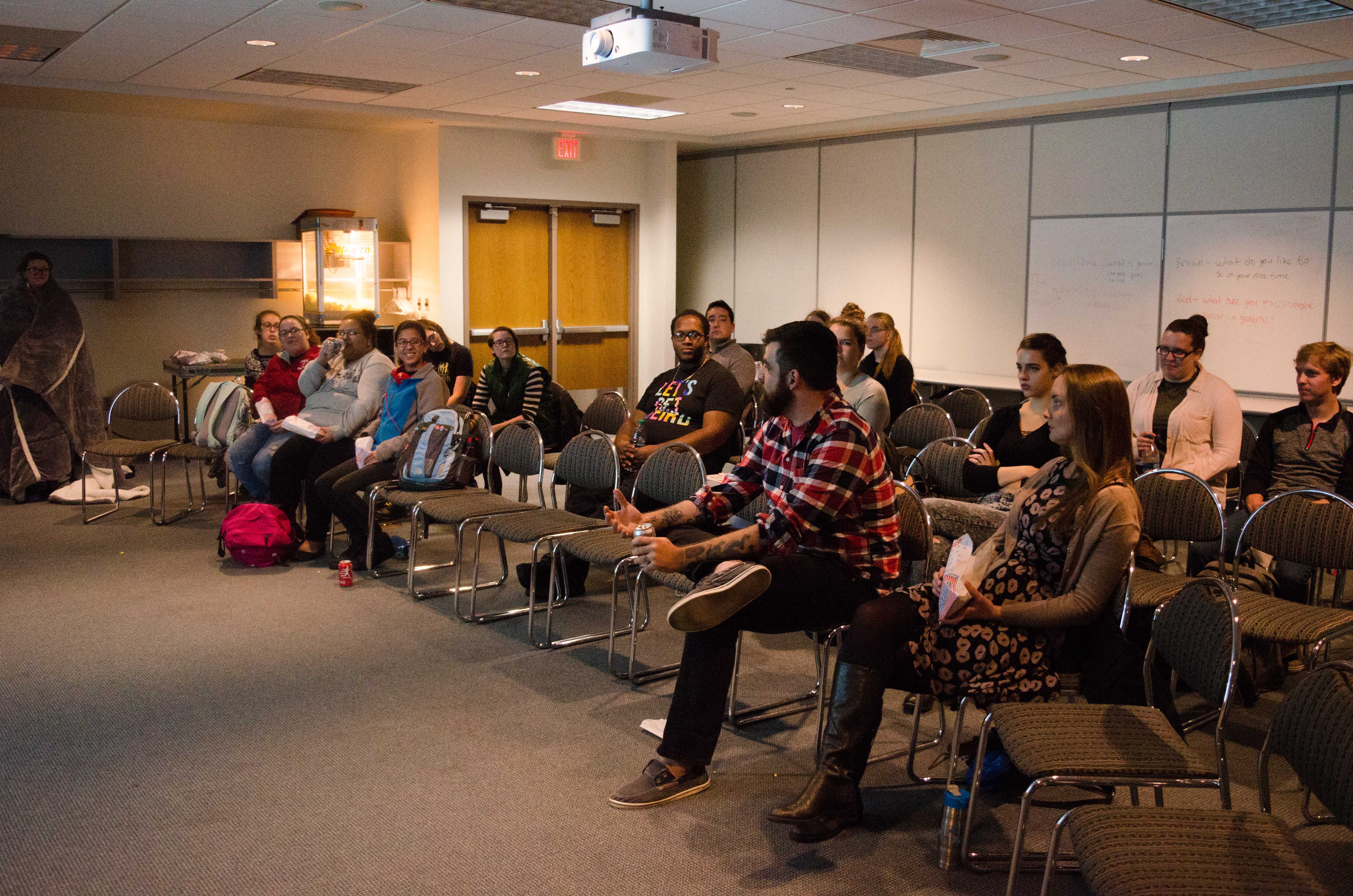 Students watch “Danish Girl” at an event in the Student Activities Center jointly hosted by Titan Productions and The Queer Straight Student Alliance. PHOTO/LEAH FICK
