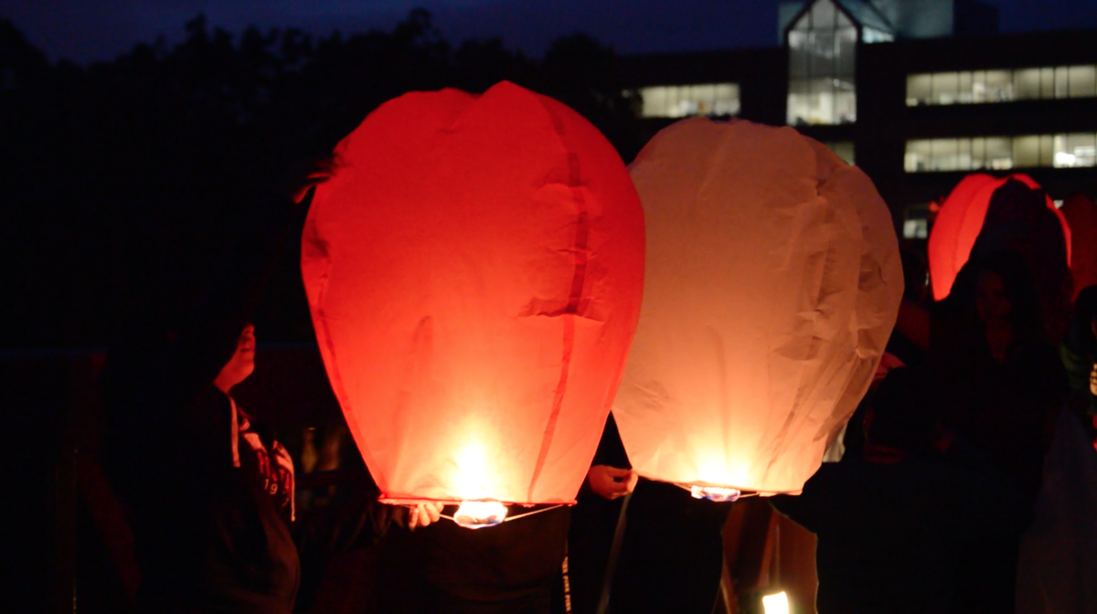 Students lighting off the now-illegal lanterns at last year’s Wish with the Chancellor event. Photo/Sarah Whitehead