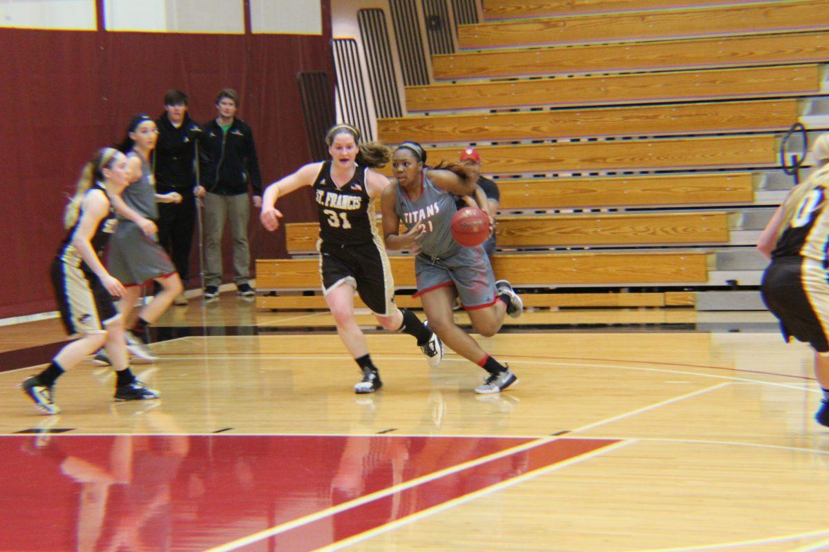 Wesley fights to get under the basket in the Lady Titan's game against St. Francis University.
Photo/CASEY MCDONALD