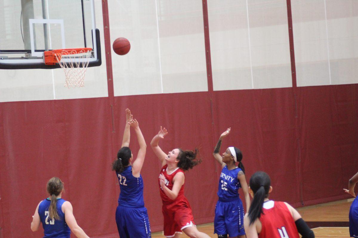 Loren Vukovits fights for a layup as she goes for a double night against Purdue Northwest. PHOTO/Casey McDonald