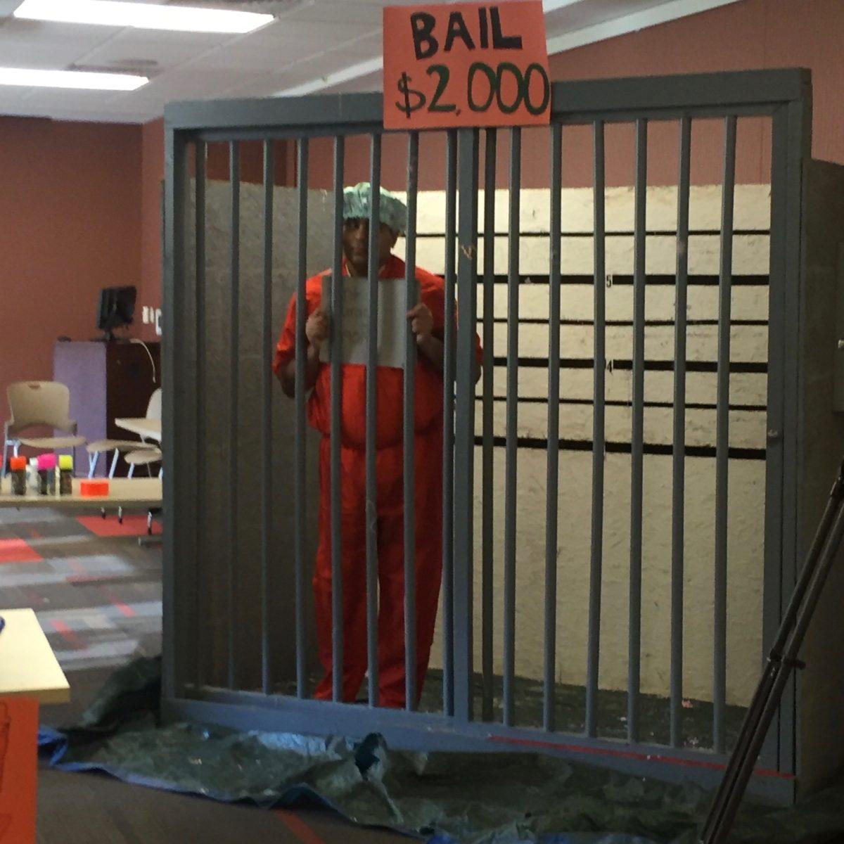 Professor Anurag Pant is in jail at the ACMC November fundraiser. Photo/ALEX HUMPHREY