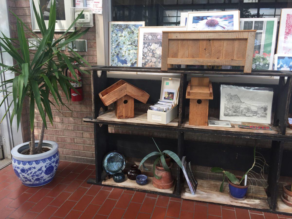 The Potawatomi Conservatories hope that they are able to fill these shelves with student worth. Emma Hux’s ceramic work (bottom left corner) is already installed and ready to sell.
PHOTO/Kate Luce