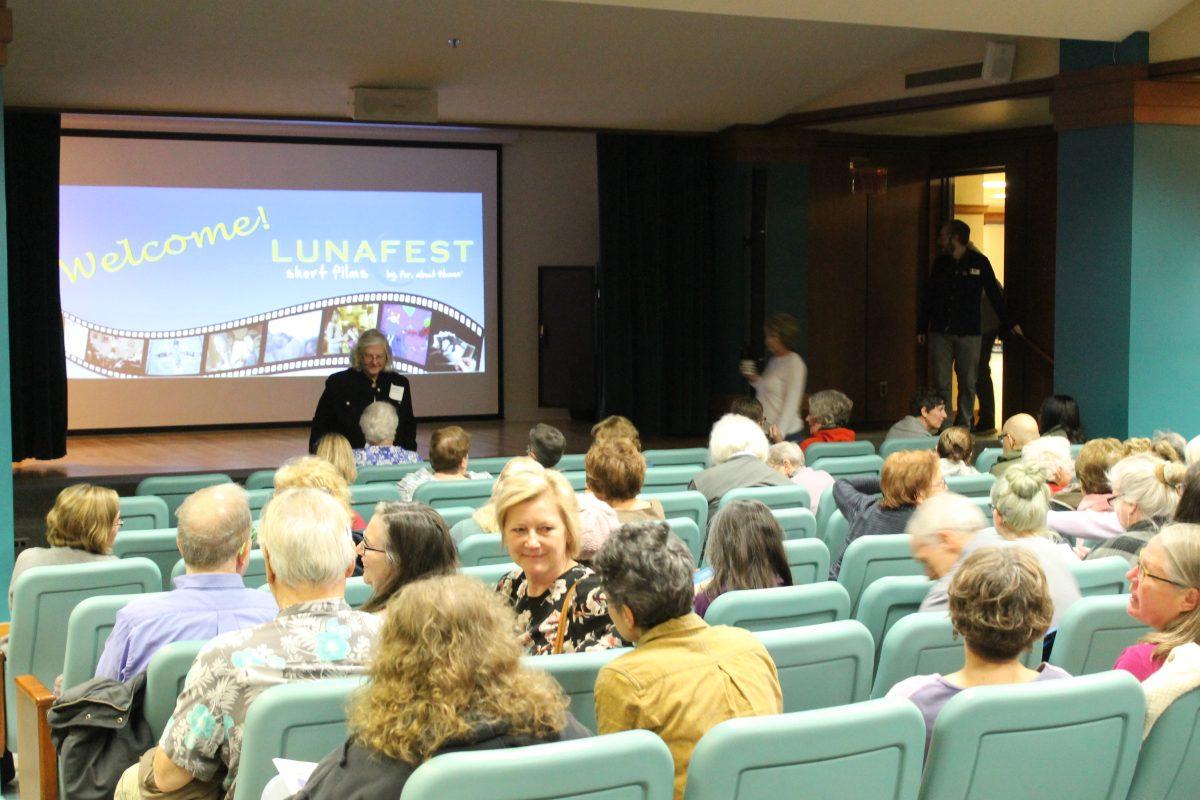 Attendees finding their seats in preparation for the film festival.

Photo/Katelyn Firestein
