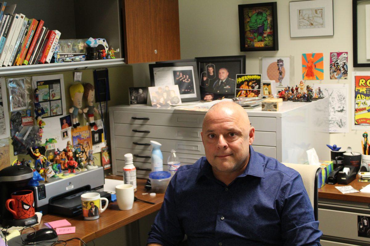 John Enrique Thompson in his office. Photo taken by Kate Luce