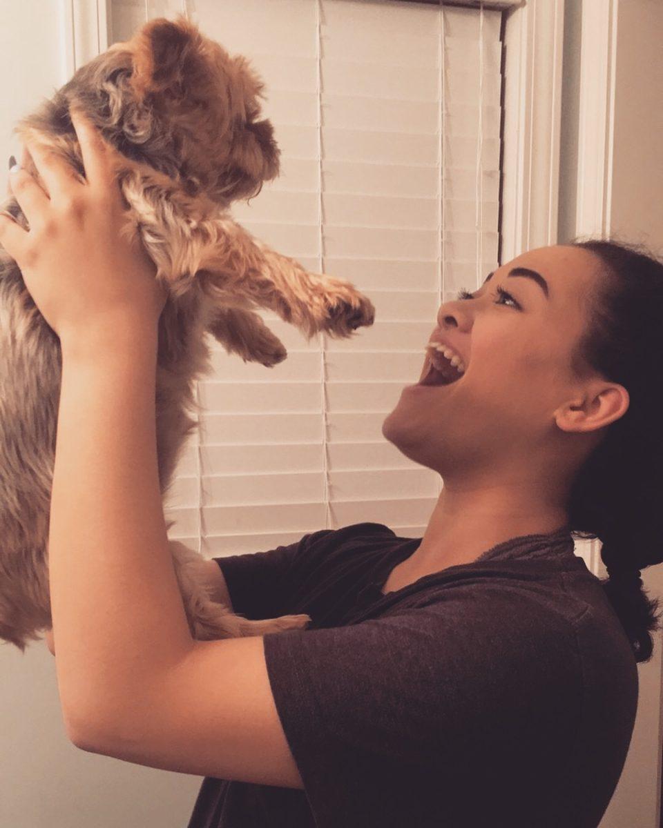 Taylor Waldron pictured with Lily the Yorkie. Photo provided by Taylor Waldron.