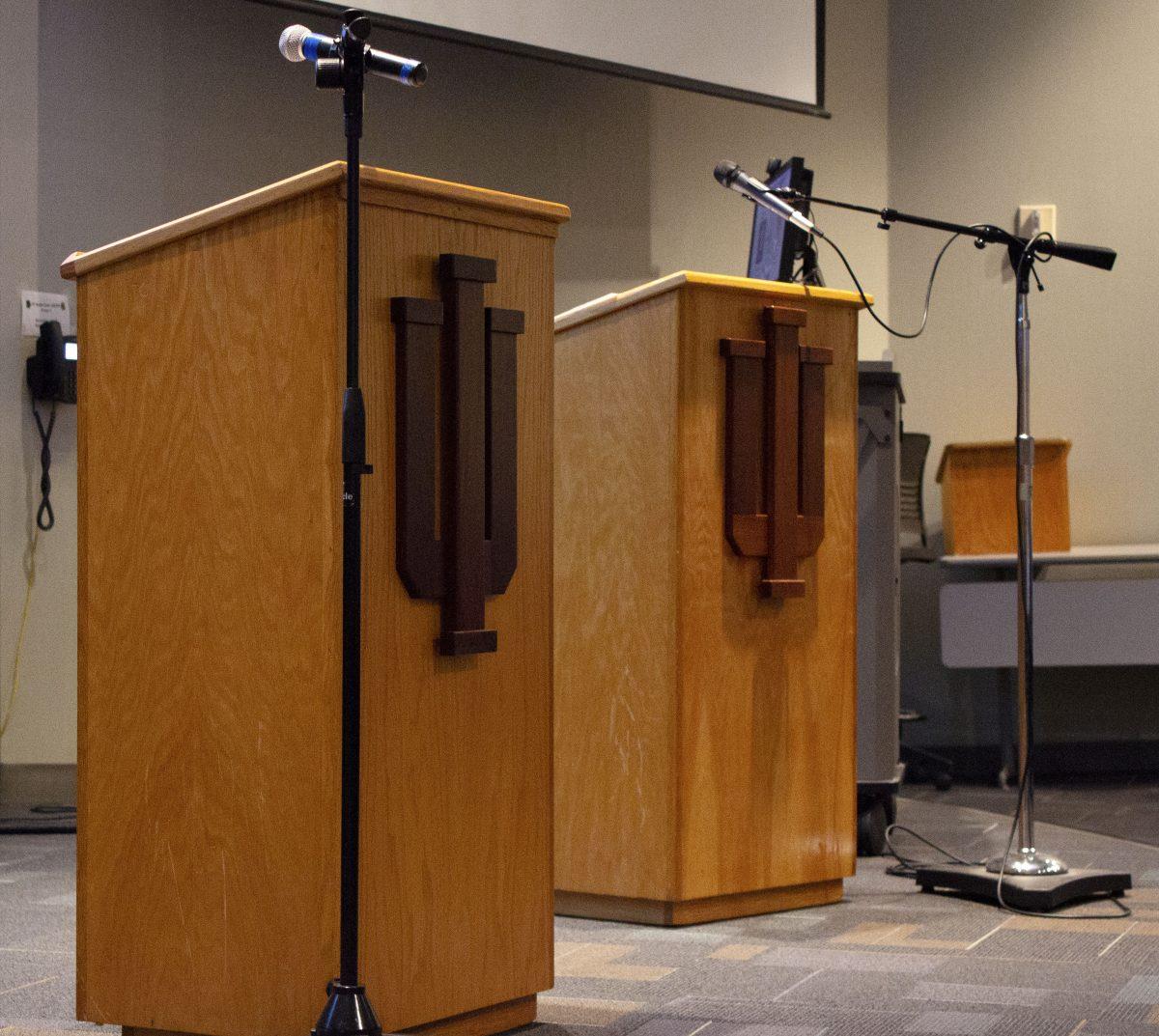 Podiums before the debate. Photo by SAVANNAH MCCASLIN