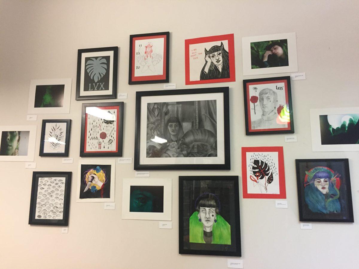 Gallery wall at Kate Luce’s art showcase, “The Mind of a Jungle Demon”. Photo by Taylor Waldron