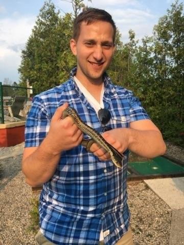 Sam Hoover holding a snake. Photo provided by Sam Hoover.