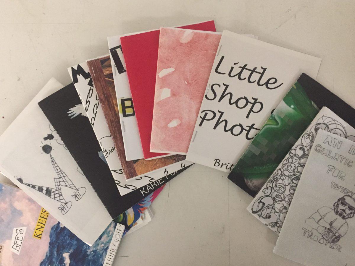 X-Books, which are essentially a zine can have a wide range of concepts and conversations. These were created by IU South Bend students in the Social Impacts of Printmaking course offered as an A-190 course. Photo by Kate Luce.