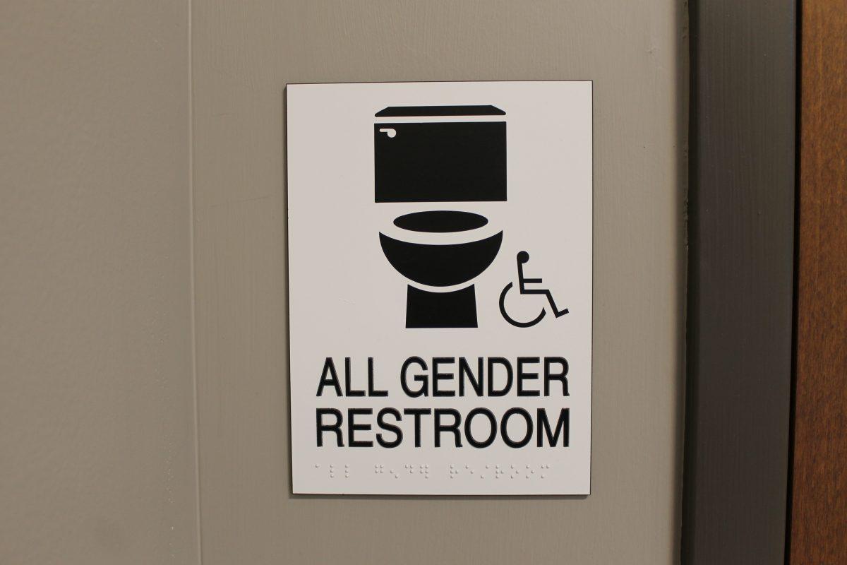 One of the signs to an all-gender bathroom in the Administration building. PHOTO BY/Katelyn Firestein