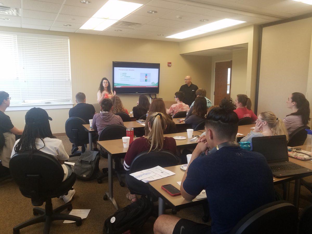 Mari Hernandez and Luis Zapata presenting about budgeting your money. Photos by/EVA MONHAUT