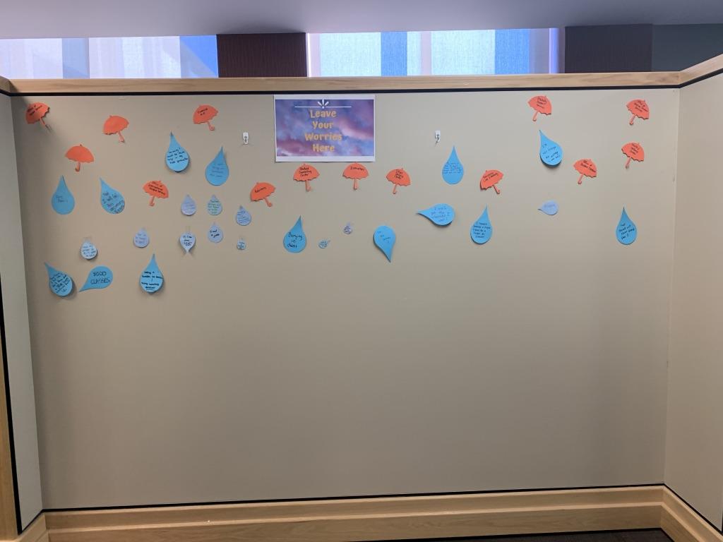 Students wrote worries and stresses, then were able to leave them on the wall. Photo by/MABEL MYERS
