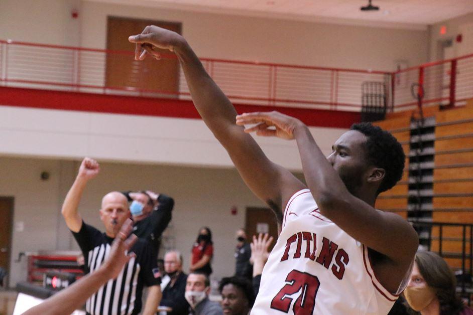 Basketball team brings home win against Holy Cross